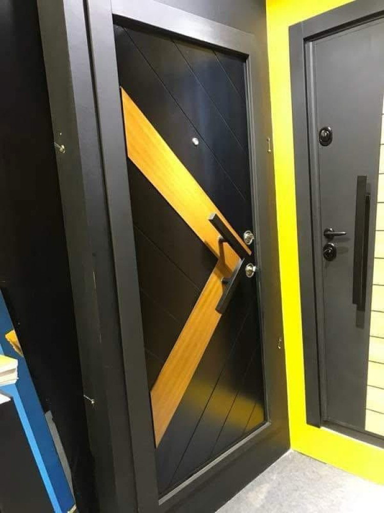 Modern black and wood-look security Door